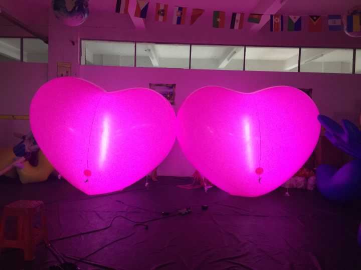 Inflatable pink heart, LED illuminated balloon, Giant heart parade balloon, pride balloon.