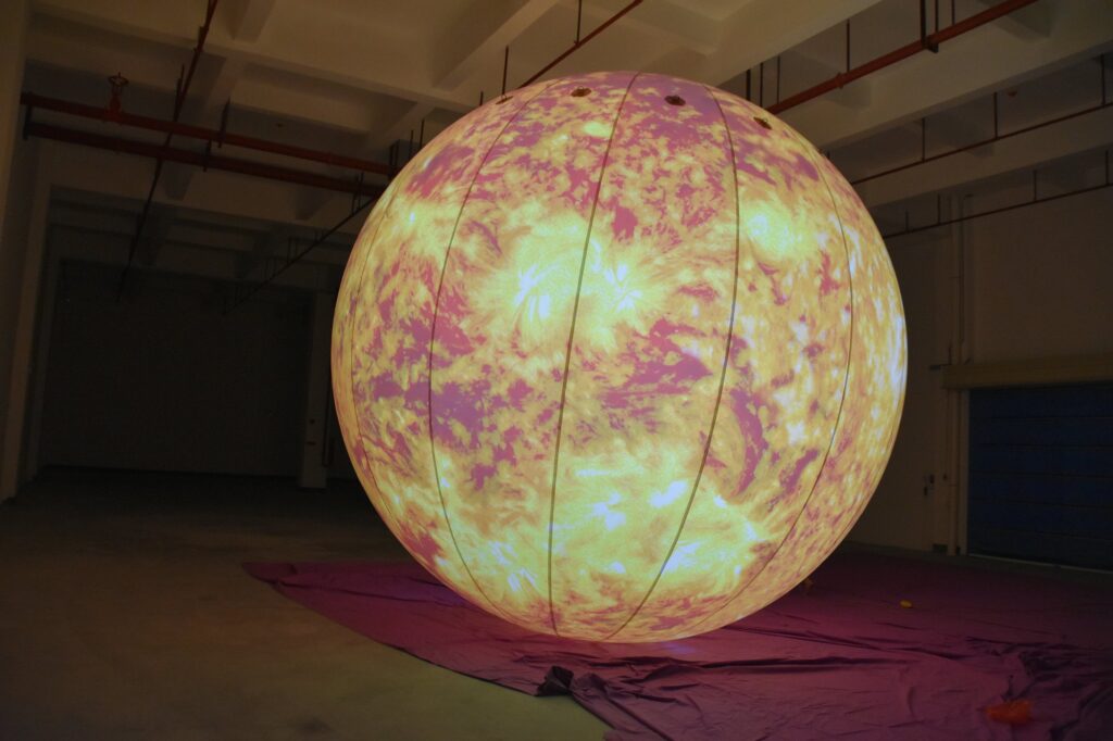 Inflatable Sphere Featuring Full Print of Sun on Test Inflation