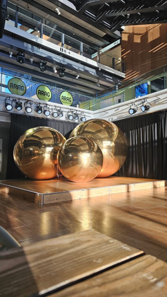 Gold Mirror Balls on Display at Bristol Beacon