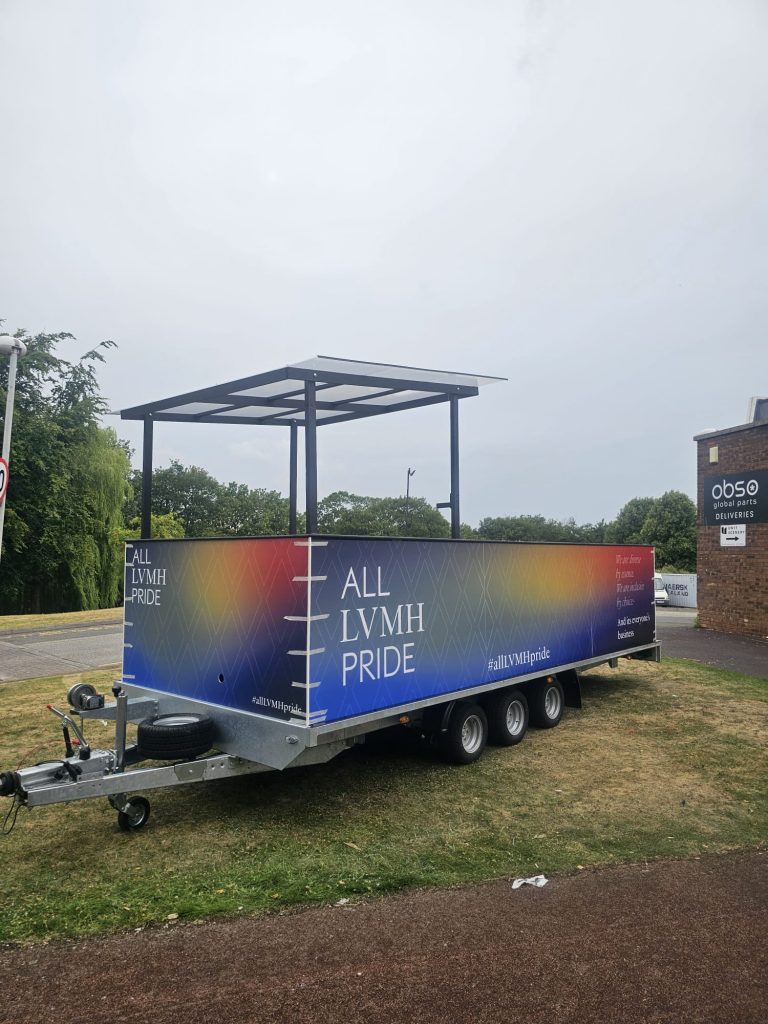 Branded Trailer. Parade Trailer. Branded Vehicle. Pride Branded Trailer. LVMH Branded Car and Trailer. LVHM at Pride.