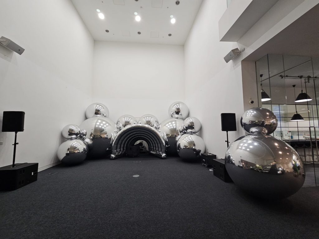 Inflatable Mirror Ball. Chrome Mirror Ball. Inflatable Advertising, Inflatable Marketing. Inflatables for Events. Display Inflatable. Tate Modern