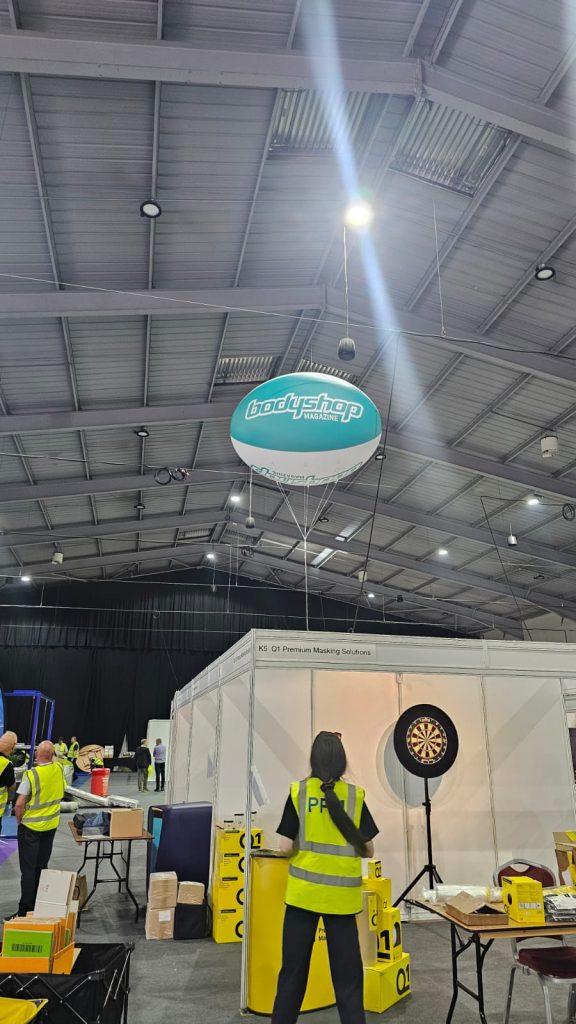 Helium Sphere. Exhibition Sphere. Inflatable at NEC. Inflatable Sphere. Advertising Inflatable. Helium Blimp. Exhibition Balloon.