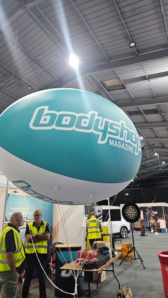 Helium Sphere. Exhibition Sphere. Inflatable at NEC. Inflatable Sphere. Advertising Inflatable. Helium Blimp. Exhibition Balloon.