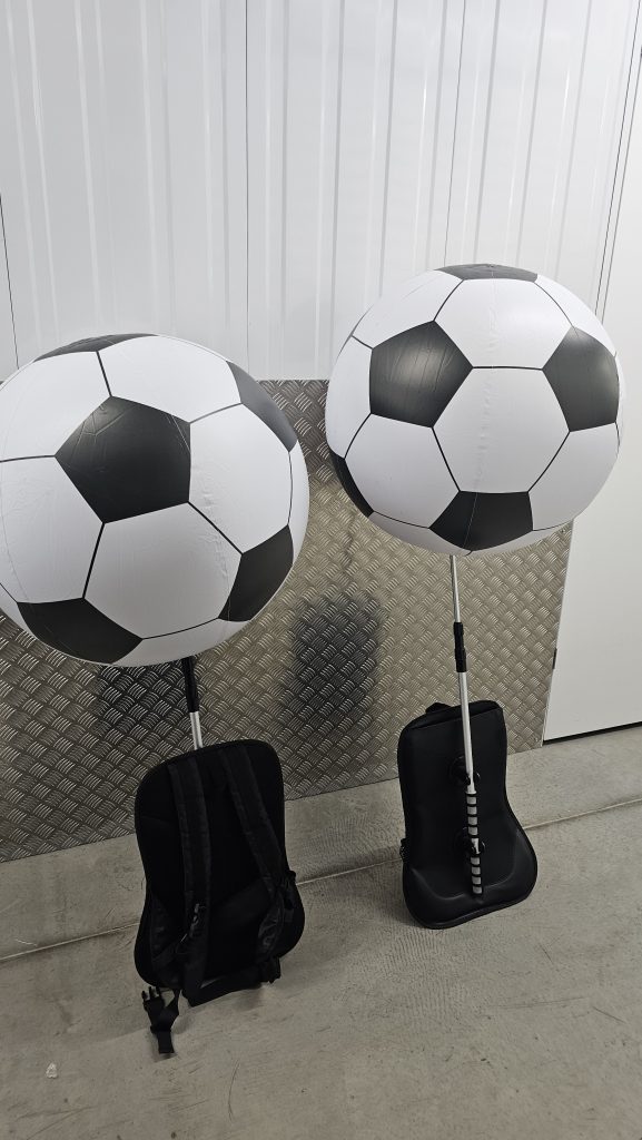 Backpack Balloon. Backpack Advertising. Football. Football Sphere. Stadium Inflatables. Event Inflatables. Event Advertising. Backpack Sphere.
