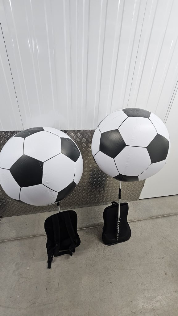 Backpack Balloon. Backpack Advertising. Football. Football Sphere. Stadium Inflatables. Event Inflatables. Event Advertising. Backpack Sphere.