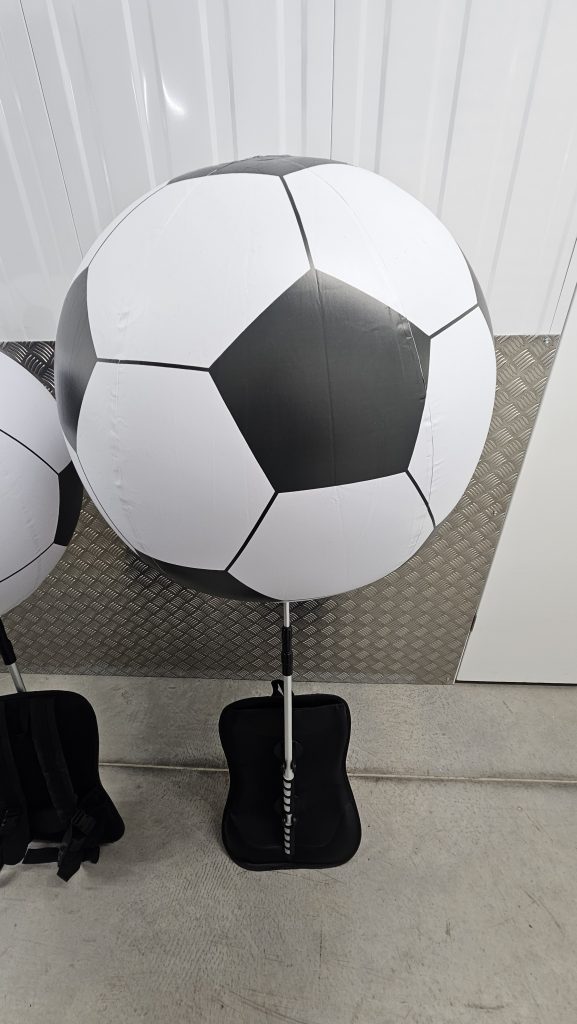 Backpack Balloon. Backpack Advertising. Football. Football Sphere. Stadium Inflatables. Event Inflatables. Event Advertising. Backpack Sphere.