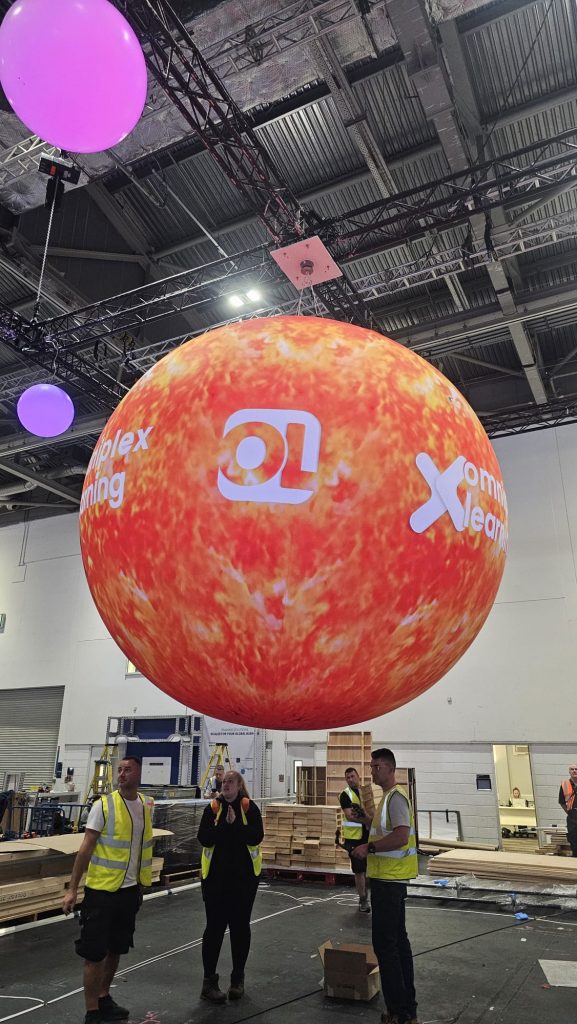 Inflatable Planet. Inflatable Sun. Sun Replica. Constant Air Inflatable. Display Inflatable. Exhibition Balloon. Exhibition Inflatable. Branded Sun. ExCel London.