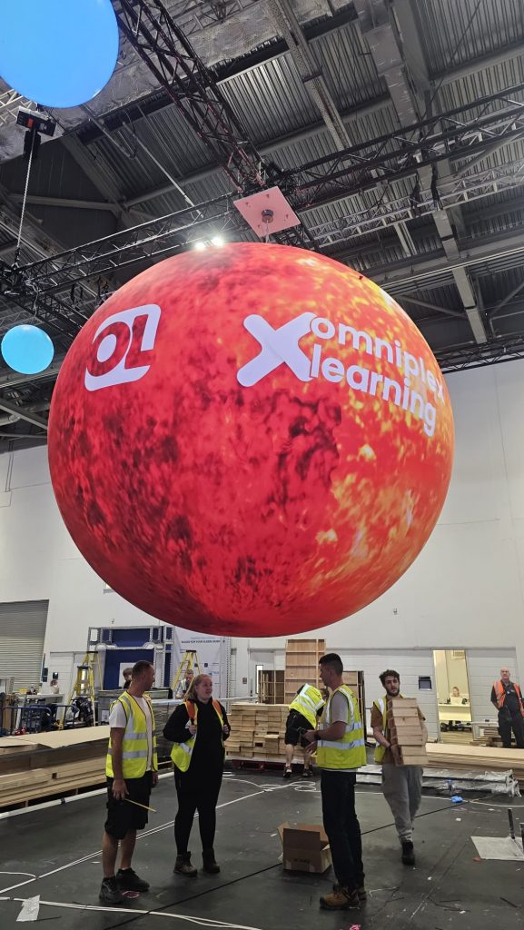 Inflatable Planet. Inflatable Sun. Sun Replica. Constant Air Inflatable. Display Inflatable. Exhibition Balloon. Exhibition Inflatable. Branded Sun. ExCel London.