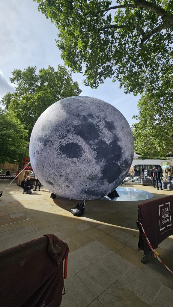 Inflatable Planet. Inflatable Moon. Moon Replica. Sealed Air Inflatable. Constant Air Inflatable. Display Inflatable. Exhibition Balloon. Exhibition Inflatable. Giant Moon. Large Inflatable Moon. Chelsea Flower Show.