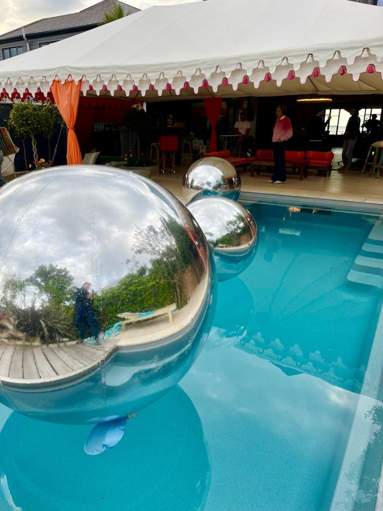 Inflatable Mirror Ball. Chrome Mirror Ball. Mirror Ball Arch. Inflatable Advertising, Inflatable Marketing. Inflatables for Events. Display Inflatable. Mirror Ball Installation.
