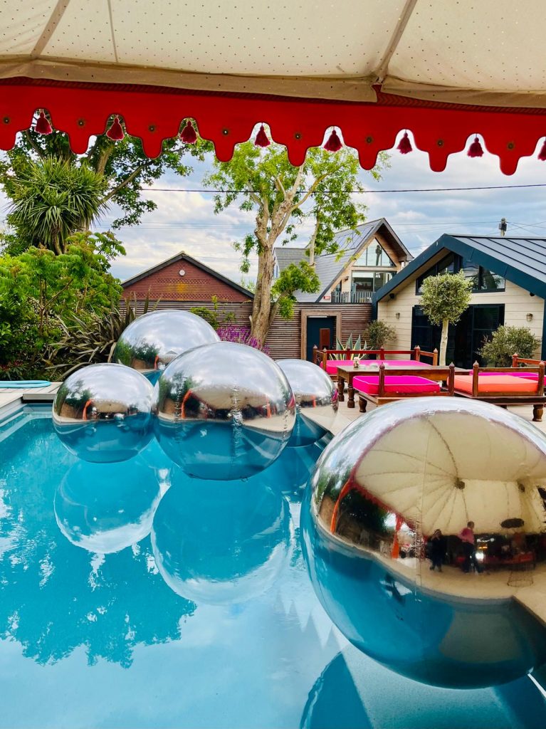 Inflatable Mirror Ball. Chrome Mirror Ball. Mirror Ball Arch. Inflatable Advertising, Inflatable Marketing. Inflatables for Events. Display Inflatable. Mirror Ball Installation.