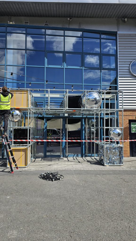 Inflatable Mirror Ball. Chrome Mirror Ball. Mirror Ball Arch. Inflatable Advertising, Inflatable Marketing. Inflatables for Events. Display Inflatable. Mirror Ball Installation.