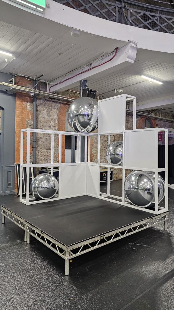 Inflatable Mirror Ball. Chrome Mirror Ball. Mirror Ball Arch. Inflatable Advertising, Inflatable Marketing. Inflatables for Events. Display Inflatable. Mirror Ball Installation.