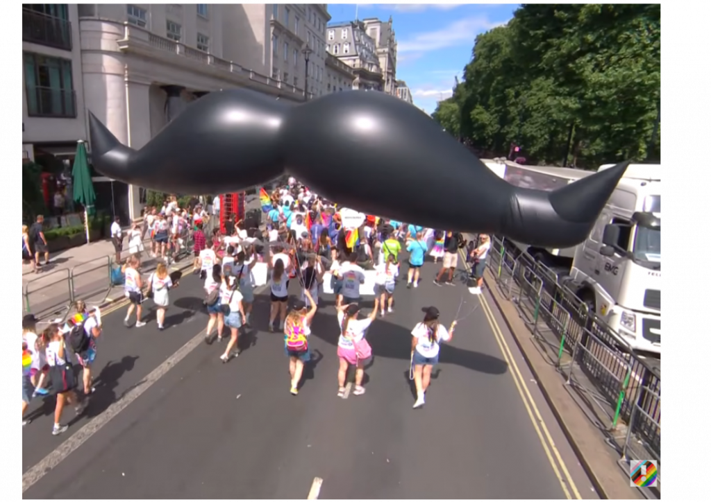 Movember Inflatable. Inflatable Moustache. Custom Shaped Inflatable. Helium Inflatable. Parade Inflatable. Pride in London.